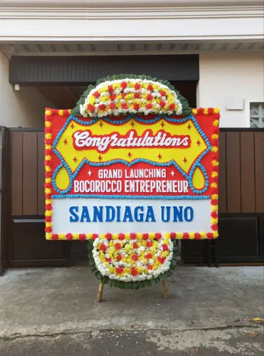Papan Bunga Opening karang tengah